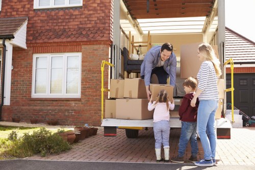 Removal van and packed boxes for a Lea Bridge home move