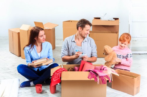Unpacking boxes in a Lea Bridge property