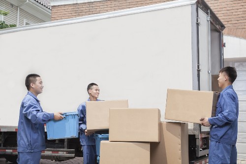 Packed office equipment and furniture ready for transport