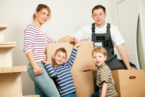 Loading household items into a removal van in Lea Bridge