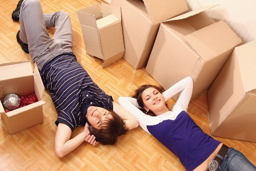 Loading boxes and furniture into a local removals van